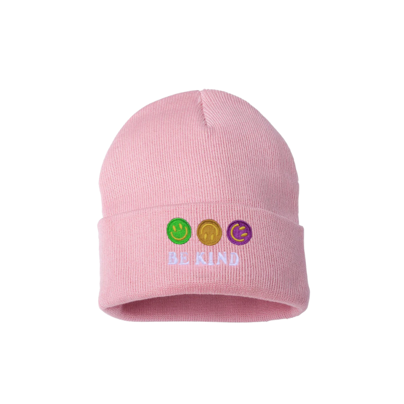 Light pink cuffed beanie. It has an embroidered on the cuff of three happy faces, green, gold and purple and a text in white color Be kind