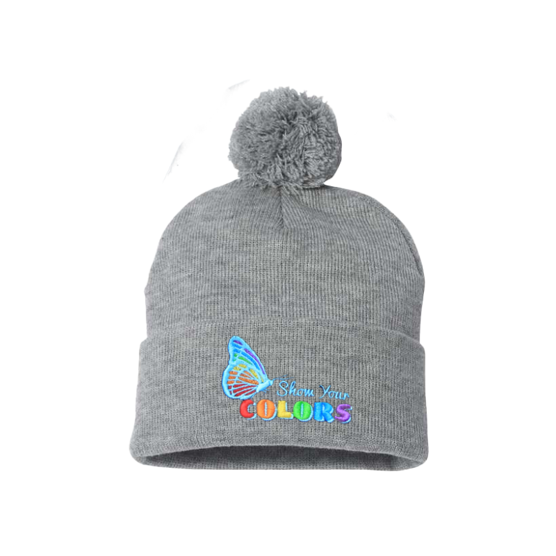 Light Gray cuffed beanie with a pom pom. It has a butterfly embroidered with the LGTB colors and the logo show your colors on the cuff