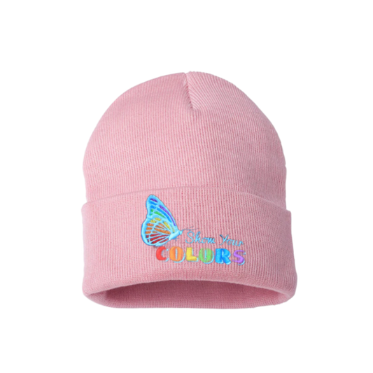 Baby pink cuffed beanie. It has an embroidered butterfly with the LGTB colors and a text show your colors on the cuff