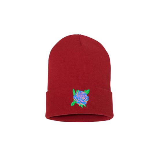 Red cuffed beanie. It has a Blue Rose with pink, yellow and green leaves embroidered on the cuff